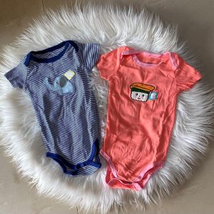 Pin under play clothes