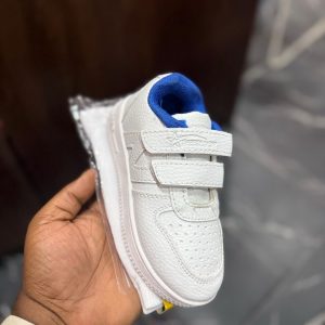 White and blue sneakers with socks