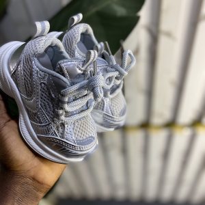 Silver sneakers in blue cartoon