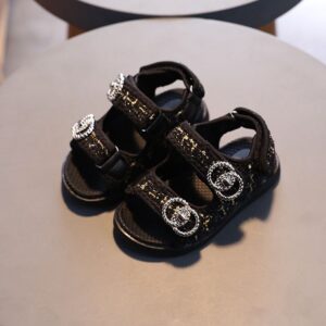 Girl’s Black and gold sandals